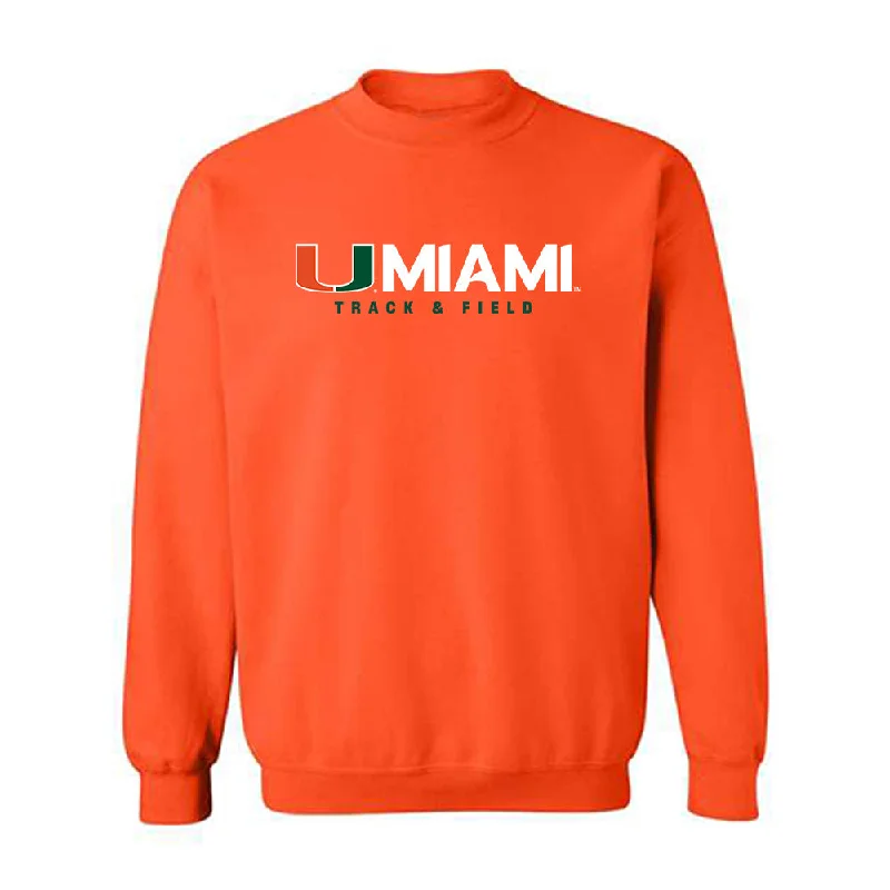 Miami - NCAA Women's Track & Field : Iyonna Codd - Classic Shersey Crewneck Sweatshirt Hoodie with Hem Lace Feminine Delicate