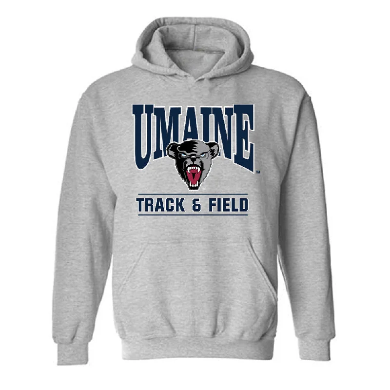 Maine - NCAA Women's Track & Field : Riley Gavigan - Classic Fashion Shersey Hooded Sweatshirt Hoodie with Camouflage Military Edgy